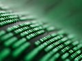 A close up of a computer keyboard with green numbers on it Royalty Free Stock Photo