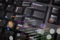 Close-up of computer keyboard with Python code overlay, illustrating software development, database programming, coding concepts, Royalty Free Stock Photo