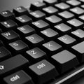 A close up of a computer keyboard showcasing a section of black keys with Royalty Free Stock Photo