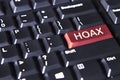 Computer keyboard with word of hoax