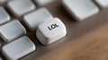 A close up of a computer keyboard with the word 'lool' on it, AI Royalty Free Stock Photo