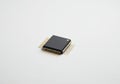 Close-up of a computer microchip on a clean background