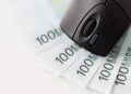 Close up of computer mouse and euro cash money Royalty Free Stock Photo