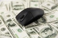 Close up of computer mouse on us dollar money Royalty Free Stock Photo