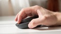 Close-up of a computer mouse on a white background. Input device for computer. Shallow focus