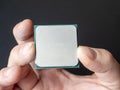 Close-up of a computer processor in a man`s hand. Concept of modern technologies Royalty Free Stock Photo