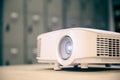 Close-up computer projector on table boardroom or meeting room Royalty Free Stock Photo