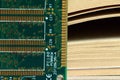 Computer RAM Random Access Memory and a book. Royalty Free Stock Photo