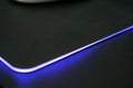 Close up of Computer RGB gaming mouse pad, Illuminated by colored LED Royalty Free Stock Photo