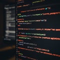 Close-up of a computer screen displaying color-coded lines of code. The text syntax is Royalty Free Stock Photo