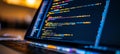 Close-up of a Computer Screen Displaying Lines of Colorful Code. Programming, Software Development. Royalty Free Stock Photo