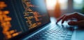 Close-up computer screen displays abstract computer code. Programmer hand typing on laptop keyboard. Developer writes programming Royalty Free Stock Photo