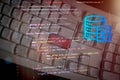 Close-up of computer source code on transparent overlay above keyboard, illustrating server-side development, data processing, and Royalty Free Stock Photo