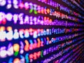 Close up of computer web page code inside of html file. Computer code data. Website codes on computer monitor. Database bits Royalty Free Stock Photo