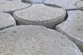 Close-up of concrete self locking flooring blocks in curved shape in a construction site