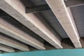 Close-up of concrete support beams underneath an overpass Royalty Free Stock Photo