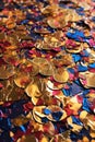 close-up of confetti on a golden reflective surface