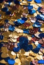 close-up of confetti on a golden reflective surface