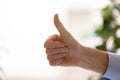 Close up confident businessman show thumbs up, business achievem