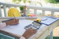 close up construction engineer man hands working at office desk architect workplace. Engineer Men hands drawing holding folder, Royalty Free Stock Photo