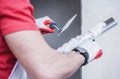 Construction Worker Applying Drywall Compound On Taping Knife Royalty Free Stock Photo