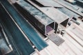 Close up of construction metals on a shelf in the warehouse of a factory. To be used in construction and building. Royalty Free Stock Photo