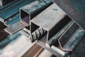 Close up of construction metals on a shelf in the warehouse of a factory. To be used in construction and building. Royalty Free Stock Photo