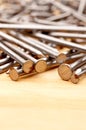 Close-up of construction nails on wood Royalty Free Stock Photo