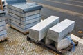 Close-up of a construction road site with pile of stone blocks Royalty Free Stock Photo