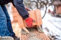 close-up of construction worker, bricklayer building new house with bricks Royalty Free Stock Photo