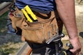 Close up of construction worker with tool belt Royalty Free Stock Photo