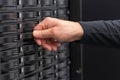 Close-up of IT Consultant Maintain SAN and Servers in Datacenter Royalty Free Stock Photo