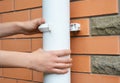 Contractor repair rain gutter downspout pipe. Roundline Guttering, Guttering & Drainage.