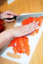 Close up cooking fish in domestic kitchen Royalty Free Stock Photo