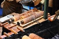 Close up of cooking the traditional sweet Czech pastry, trdelnik-trdlo