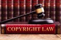 Copyright Law Book And A Judge Gavel On Desk Royalty Free Stock Photo