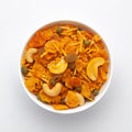 Close up of corn flex mixture Indian namkeen snacks on a ceramic white bowl. Royalty Free Stock Photo