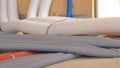 CLOSE UP: Corrugated tubing runs along the ground of a house under construction.