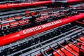 Close up of Costco Wholesale logo printed on the shopping carts