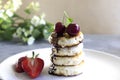 Close-up of cottage cheese pancakes with cherries