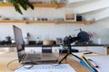 Close up of countertop with laptop and microphone in kitchen Royalty Free Stock Photo