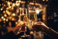 close up of couple clinking glasses of champagne at christmas party, Close up of people toasting with christmas champagne glasses Royalty Free Stock Photo