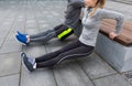 Close up of couple doing triceps dip on bench Royalty Free Stock Photo