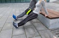 Close up of couple doing triceps dip on bench Royalty Free Stock Photo