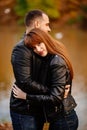 Close up. couple hug in autumn park near river Royalty Free Stock Photo