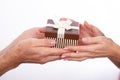 Couple& 039;s hand holding gift box Royalty Free Stock Photo