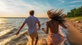 couple walking on the beach, boy and girl walking on the beach, couple together, couple running on the beach Royalty Free Stock Photo