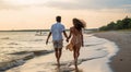 couple walking on the beach, boy and girl walking on the beach, couple together, couple running on the beach Royalty Free Stock Photo