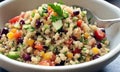 couscous with chopped salad vegetables in a bowl