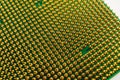 Close-up of CPU microchip gold pins, semiconductor technology background. Royalty Free Stock Photo